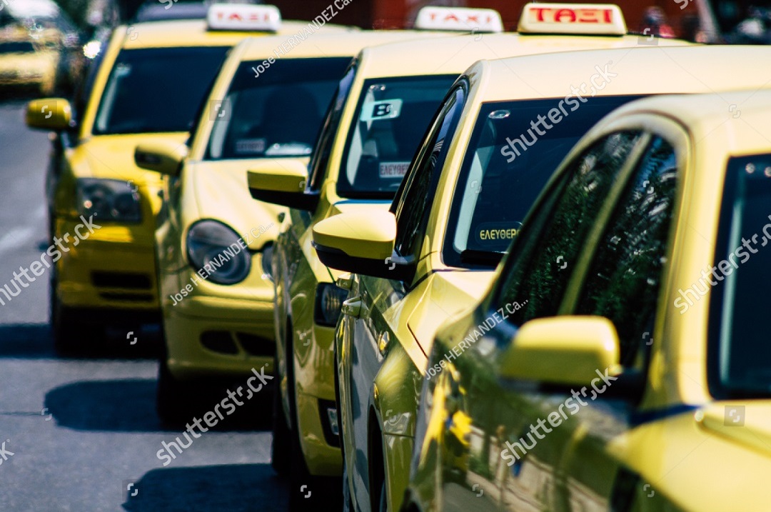 stockphotoathensgreeceaugustviewofgreekyellowtaxisrolling